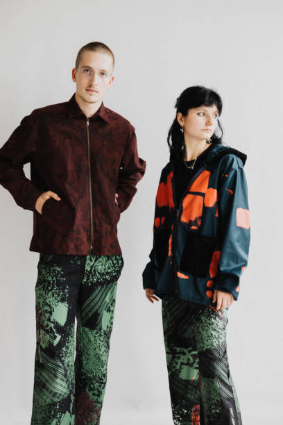 istock Young Models Standing Wearing Multicolored Fashion Clothes 2104501378