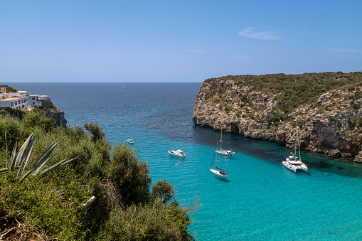 Sea bay at the village of Cala en Porter in Menorca.