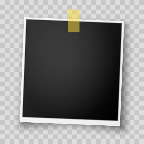 istock Realistic layout of Polaroid photo frame with adhesive tape on transparent background. 2104545172