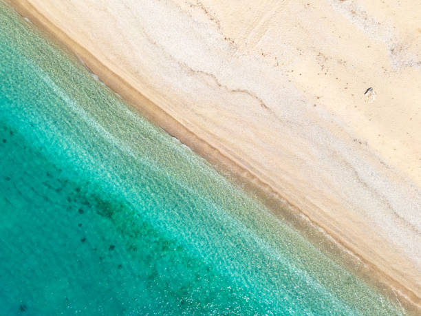 istock Perfect beach and aqua sea 2104551452