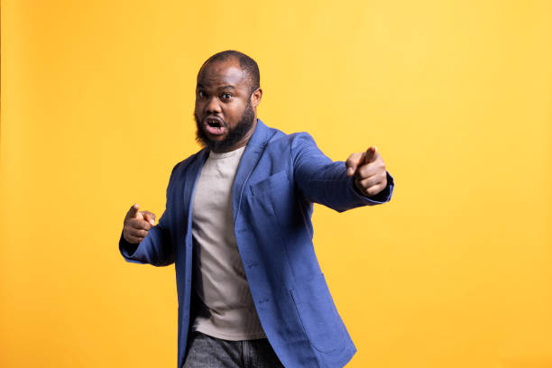 istock Portrait of motivational speaker holding monologue, studio background 2104572247
