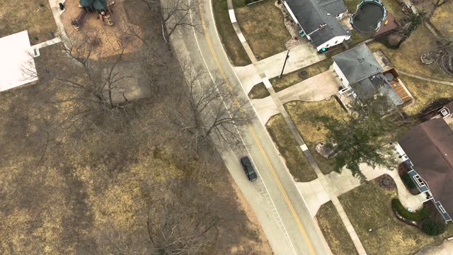 Direct aerial over a beach town neighborhood.