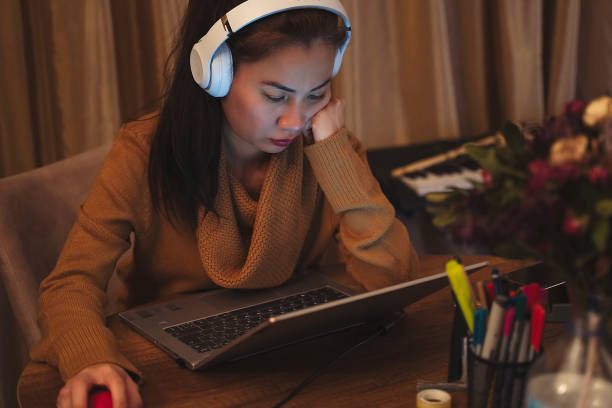istock Woman working at home 2104664212