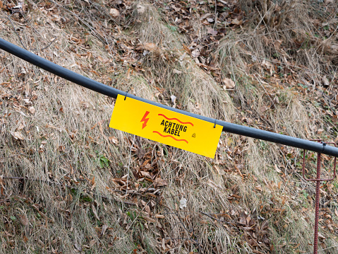 Achtung Kabel (Caution Electric Cable) Sign