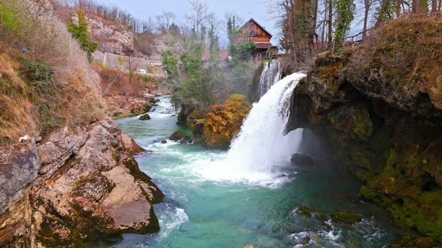 AERIAL Drone Shot of Clear Water Falling Down Cliff in Plitvice Lakes National Park, Croatia