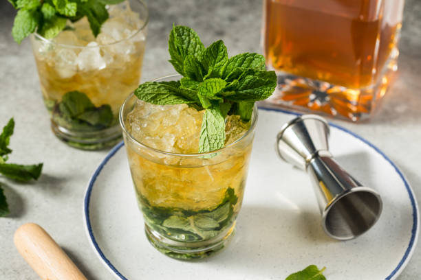 Frozen Bourbon Kentucky as Julep Frozen Bourbon Kentucky Mint Julep with Sugar kentucky derby stock pictures, royalty-free photos & images