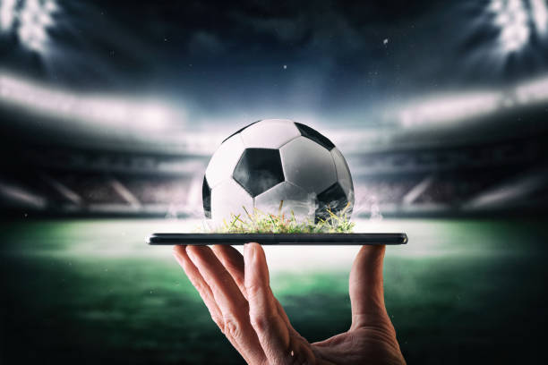 istock Soccer championship live online broadcast concept with mobile and stadium 2104776742