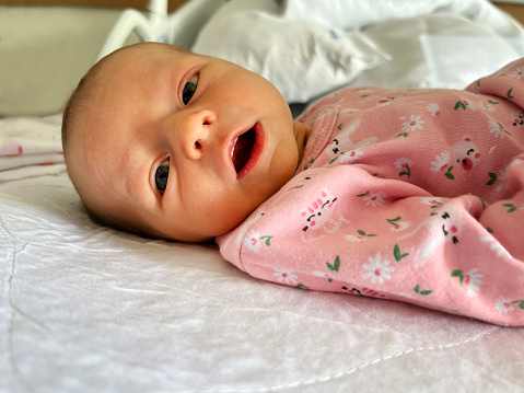 Three week old baby girl portrait
