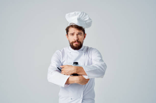 istock chef with a saucepan in his hands restaurant emotions cooking 2104861781