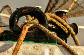 The mooring rope keeps the ship at the quay, detail