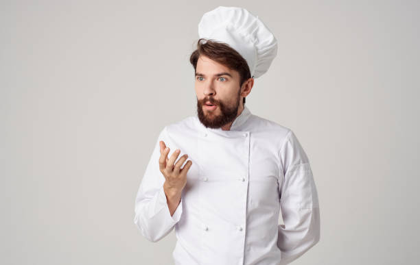 istock bearded man chef uniform professional food preparation 2104872488