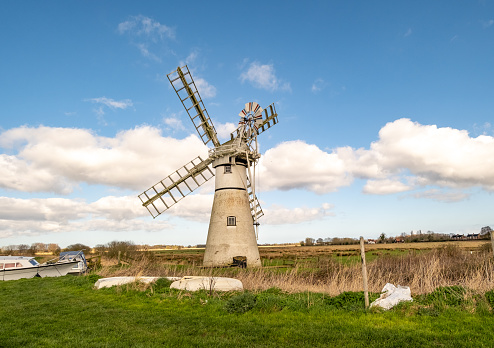 Grassland, moor and windmill in national park Oude Venen between Eernewoude en Oudega, Friesland, Netherlands