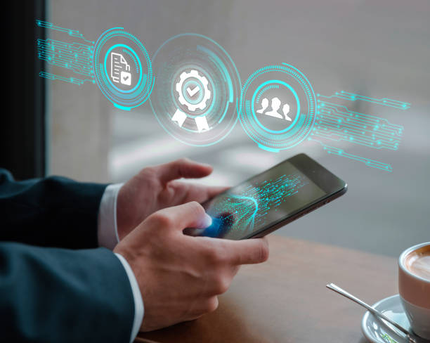 istock Person in social suit using smartphone mobile phone with augmented reality technology drinking coffee 2104892099