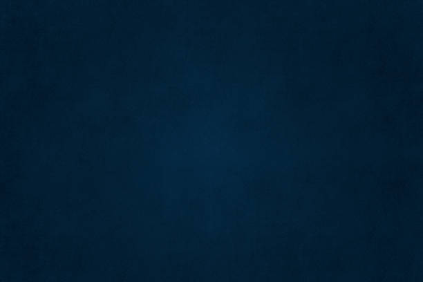 istock Abstract navy blue texture wallpaper with vignette 2104905348