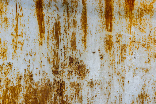 white painted steel surface with stains of rust - full-frame background and texture.