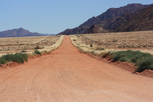 Road Sign to Ozonjuitji M'bari Waterhole at Etosha National Park in Kunene Region, Namibia