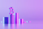 Bitcoin symbol with coins, financial background, neon lighting