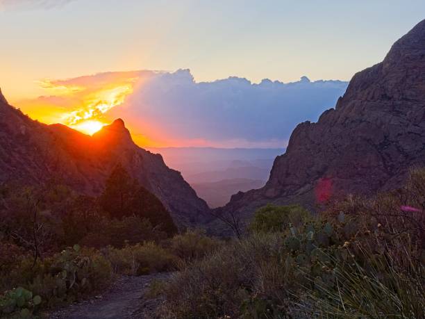 istock The Chisos mountain window view through dramatic colorful sunset in Big Bend 2105066621