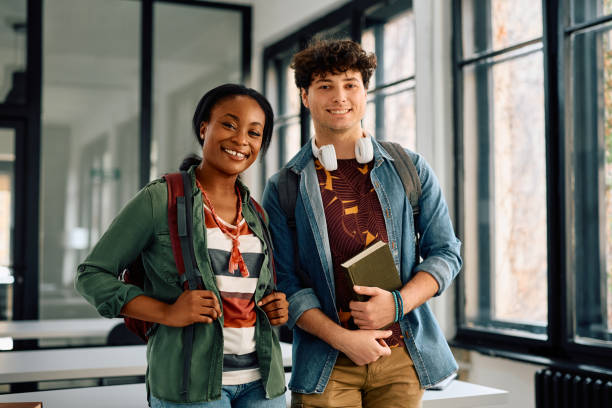istock Happy multiracial students at the university looking at camera. 2105097904