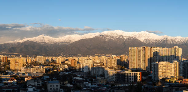 istock Santiago de Chile and the snowy Andes at sunset 2105149733