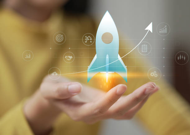 istock Businessman holding rocket is launching for growing business. 2105167670