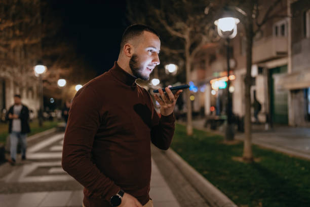 istock Handsome Man's Journey Through Neon Nights 2105193482