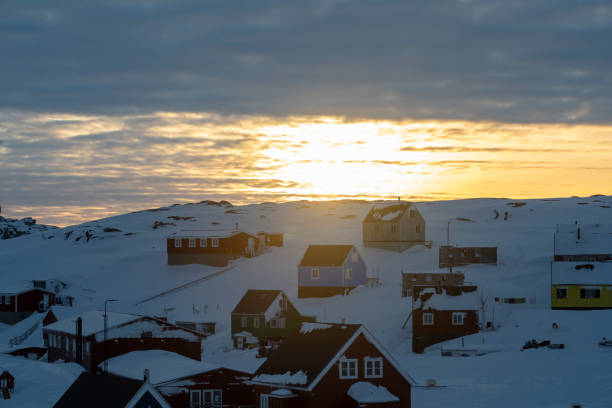 istock Sunrise over community in winter 2105316885