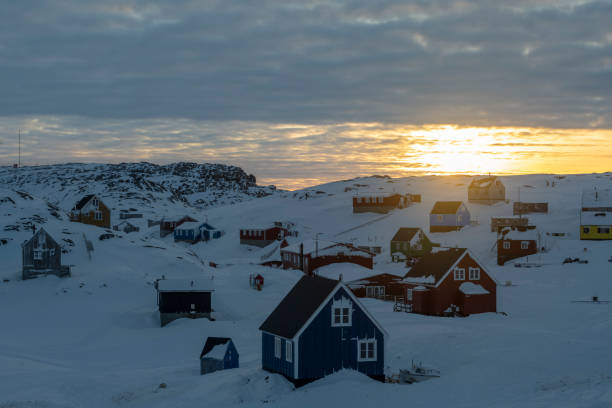 istock Sunrise over community in winter 2105317934