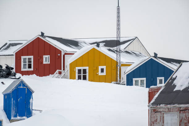 Colourful houses in snow