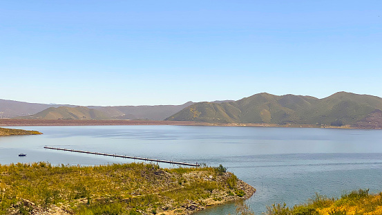 Diamond Valley Lake, located in Hemet, California is one of the largest water reservoirs in Southern California.  After a wet winter the reservoirs levels have returned to a more normal level.  This lake is used to supply California residents with their water needs.
