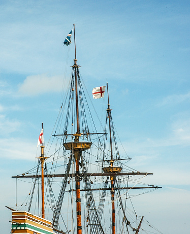 The ships masts reach high into the sky.