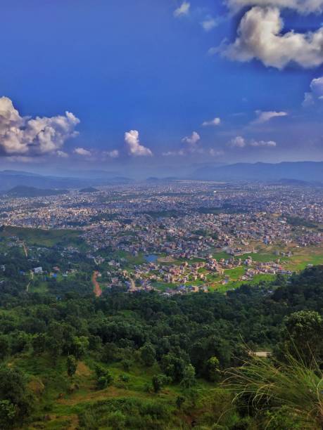 istock Beautiful city with green forest 2105437757