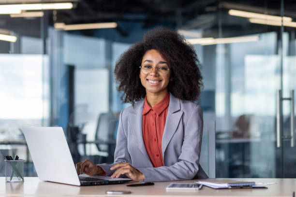 istock Professional businesswoman working diligently at her desk 2105451645