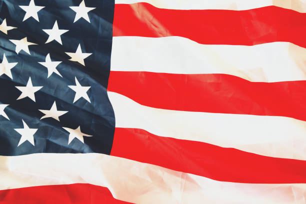 istock United States flag background concept. 2105585523