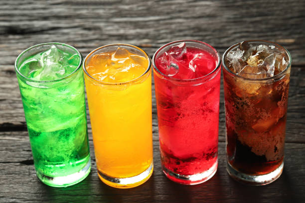 istock Soft drinks and fruit juice mixed with soda high in sugar have a negative effect on physical health 2105613128