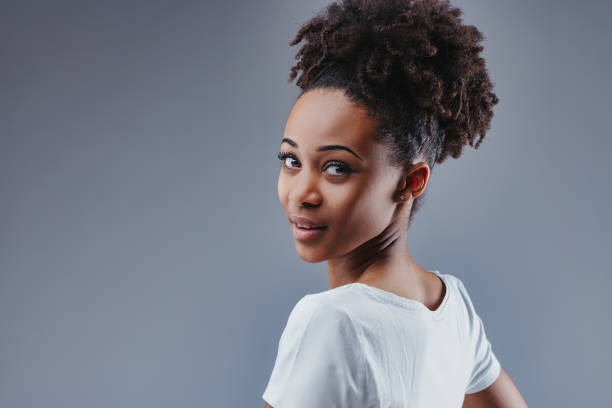 istock Subtle turn, engaging smile, warmth, and intrigue 2105619418