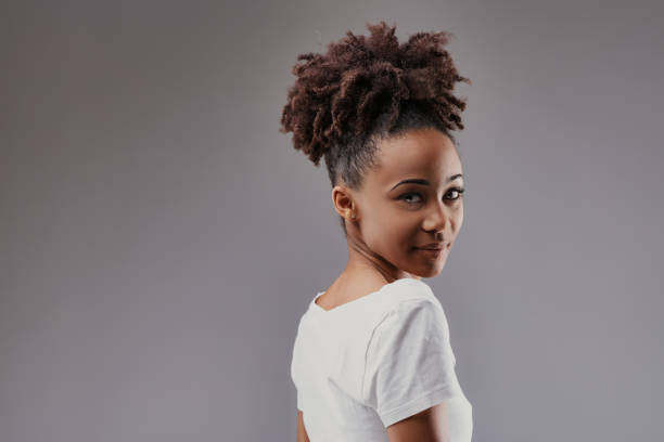 istock Subtle turn, engaging smile, warmth, and intrigue 2105619944