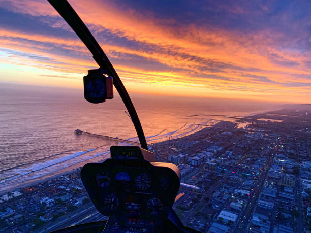 istock Sunset view from a helicopter along the California coastline. 2105622515