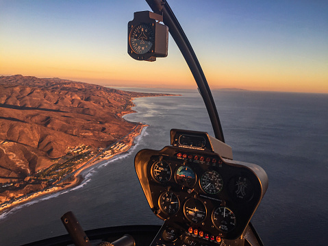 Golden hour from a helicopter along the California coastline.