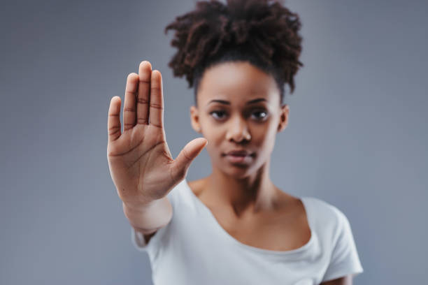 istock Non-verbal strength displayed, stopping advances decisively 2105735503