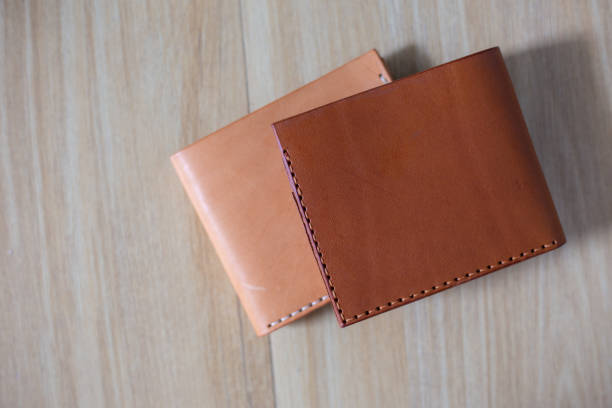 istock Genuine leather bifold money wallet with crafts tool 2105822519