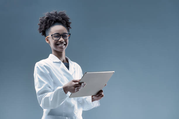 istock Tech expert smiles, AI advancement at fingertips 2105834034