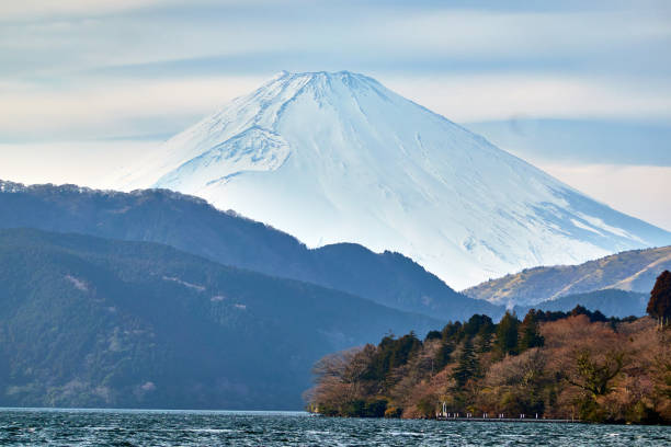 istock Snowcapped mountain and lake 2105942500