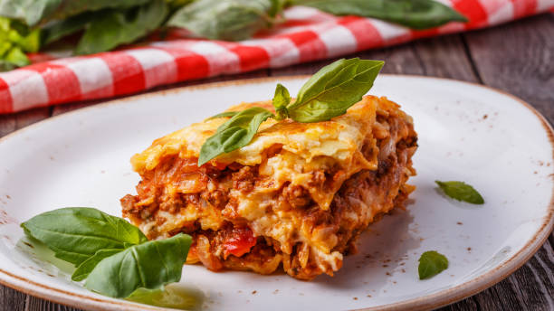 istock Traditional lasagna made with minced beef bolognese sauce 2106008576