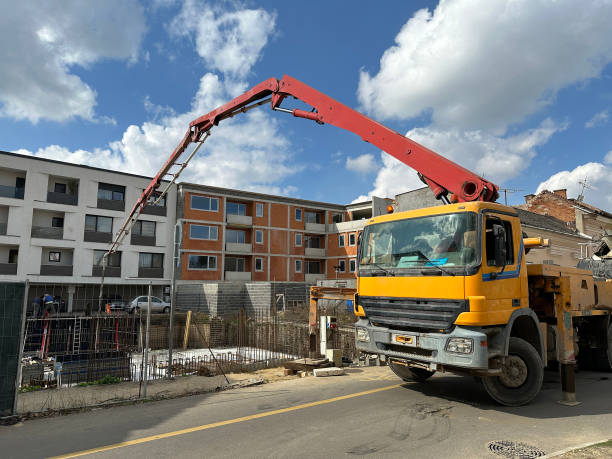 istock Concrete pump vehicle at the construction site 2106040937