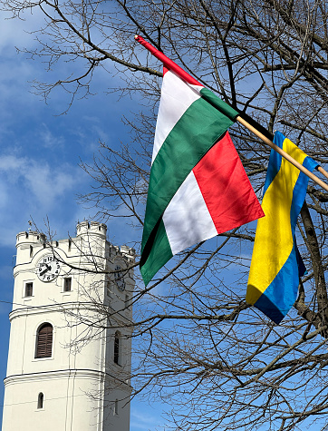 Hungarian national flag and the church tower