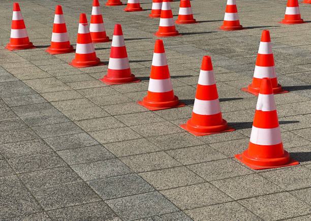istock Traffic cones on the paving stone area 2106043031