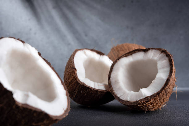istock Cracked coconut fruit and whole coconut 2106073774