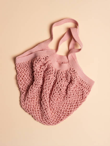istock Homemade pink crochet string bag 2106077024