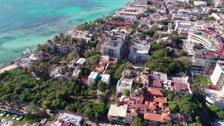 Playa Del Carmen, Mexico. Revealing Drone Shot of Waterfront Buildings and Beach on Caribbean Sea